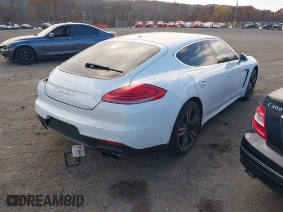 2014 Porsche Panamera S E-Hybrid with VIN WP0AD2A76EL044722, listed as a IAAI auction lot 40716615 with 52,474 mi miles and . Bid and sale history available at DreamBid. Image 4.