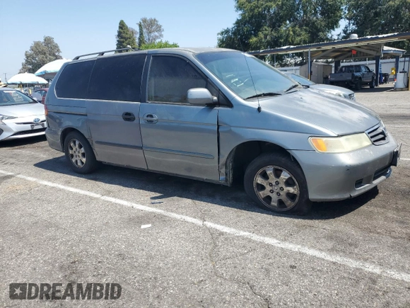 2002 Honda Odyssey EX-L with VIN 2HKRL189X2H530814, listed as a Copart auction lot 62280465 with 270,080 mi miles and Salvage title. Bid and sale history available at DreamBid. Image 4.