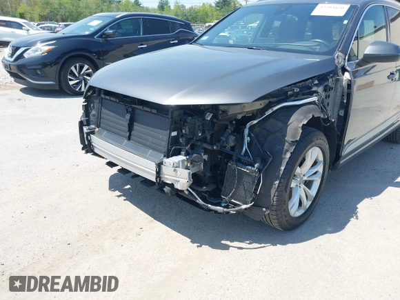 2018 Audi Q7 Premium Plus with VIN WA1LAAF70JD033878, listed as a IAAI auction lot 42203820 with 95,095 mi miles and . Bid and sale history available at DreamBid. Image 6.