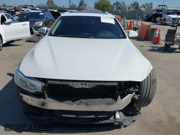 2015 BMW 4 Series 428i with VIN WBA4A9C50FGL85857, listed as a IAAI auction lot 42542619 with 136,411 mi miles and . Bid and sale history available at DreamBid. Image 13.