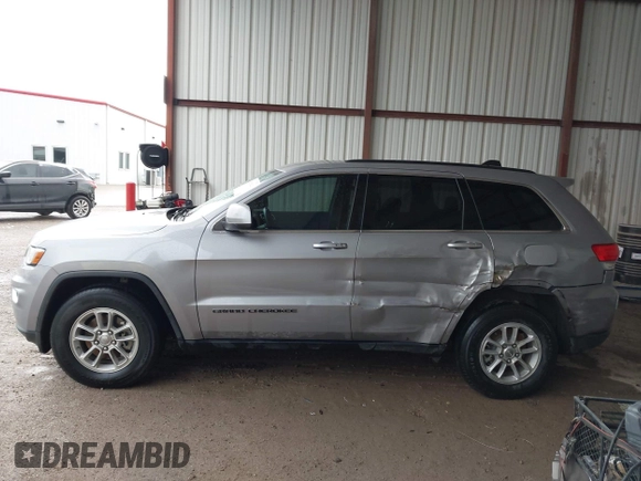 2018 Jeep Grand Cherokee Laredo E with VIN 1C4RJEAG1JC275356, listed as a IAAI auction lot 42150422 with 69,720 mi miles and . Bid and sale history available at DreamBid. Image 14.