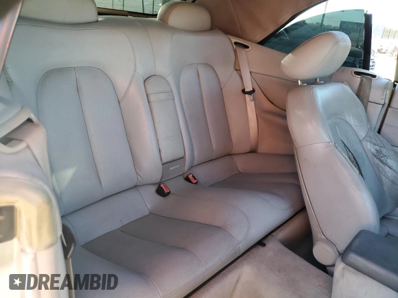 1999 Mercedes-Benz CLK 320/430 z VIN WDBLK65G2XT024808, wystawiony jako Copart lot #85336294 z przebiegiem 289 898 mil mil oraz Szkoda całkowita • Salvage title. Historia ofert i sprzedaży dostępna na DreamBid. Obrazek 11.