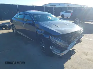 2022 Honda Accord Touring with VIN 1HGCV3F96NA011657, listed as a IAAI auction lot 41701375 with 13,681 mi miles and . Bid and sale history available at DreamBid. Image 1.