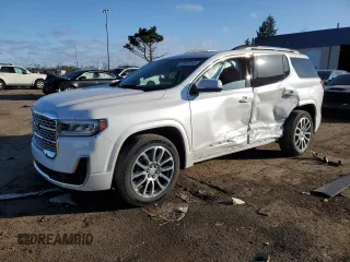 2023 GMC Acadia Denali z VIN 1GKKNXLS1PZ169972, wystawiony jako Copart lot #50825765 z przebiegiem 9 798 mil mil oraz Czysty tytuł • Clean title. Historia ofert i sprzedaży dostępna na DreamBid. Obrazek 1.