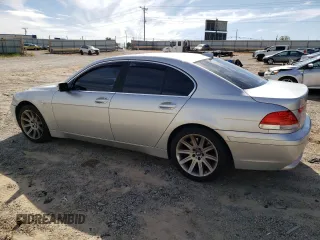 2003 BMW 7 Series 745i with VIN WBAGL63473DP68267, listed as a Copart auction lot 69923064 with 100,468 mi miles and Salvage title. Bid and sale history available at DreamBid. Image 2.