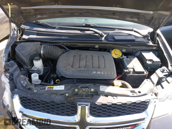 2016 Dodge Grand Caravan SXT with VIN 2C4RDGCG0GR333344, listed as a IAAI auction lot 41988558 with 79,454 mi miles and . Bid and sale history available at DreamBid. Image 10.