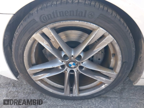 2016 BMW 6 Series 640i xDrive with VIN WBA6D2C51GGT66209, listed as a IAAI auction lot 42064405 with 113,500 mi miles and . Bid and sale history available at carsss.com. Image 12.