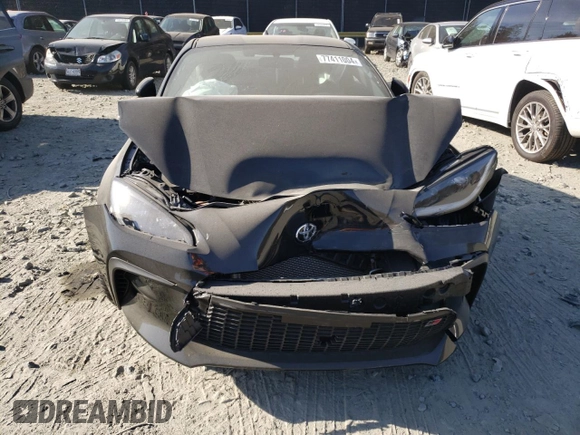 2024 Toyota GR86 Premium with VIN JF1ZNBE16R8756975, listed as a Copart auction lot 77411004 with 5,458 mi miles and Salvage Title. Bid and sale history available at carsss.com. Image 5.