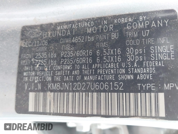 2007 Hyundai Tucson SE with VIN KM8JN12D27U606152, listed as a IAAI auction lot 41465051 with 141,478 mi miles. Bid and sale history available at carsss.com. Image 9.