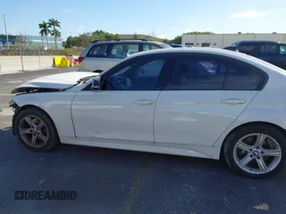 2014 BMW 3 Series 328i with VIN WBA3A5C55EP647035, listed as a IAAI auction lot 41480711 with 105,792 mi miles. Bid and sale history available at carsss.com. Image 14.