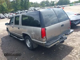 1999 GMC Suburban with VIN 3GKEC16R0XG547353, listed as a IAAI auction lot 40426884 with 284,689 mi miles. Bid and sale history available at carsss.com. Image 3.