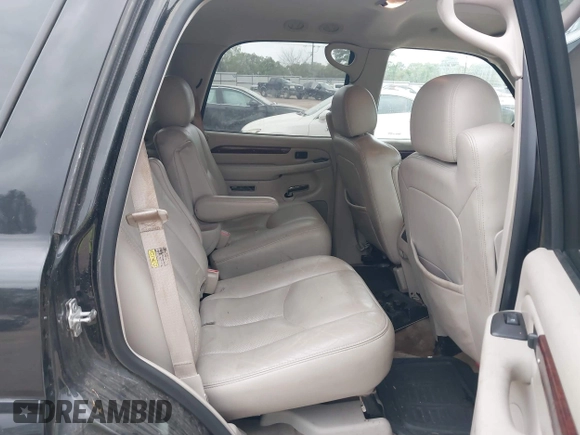 2005 Cadillac Escalade z VIN 1GYEC63TX5R203156, wystawiony jako IAAI lot #41937137 z przebiegiem 239 919 mil mil oraz . Historia ofert i sprzedaży dostępna na DreamBid. Obrazek 8.