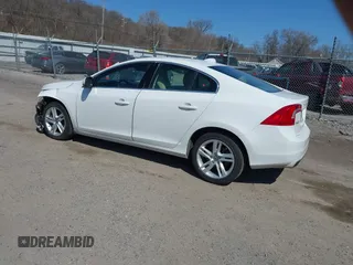 2014 Volvo S60 T5 с VIN YV1612FS1E2297930, выставлен на аукционе IAAI как лот 41906564 с пробегом 88 843 миль миль и . История ставок и продаж доступна на DreamBid. Изображение 3.