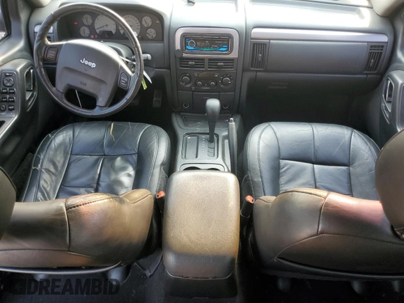 2002 Jeep Grand Cherokee Limited with VIN 1J4GX58S82C230247, listed as a Copart auction lot 73573554 with 160,357 mi miles and Salvage Title. Bid and sale history available at DreamBid. Image 8.