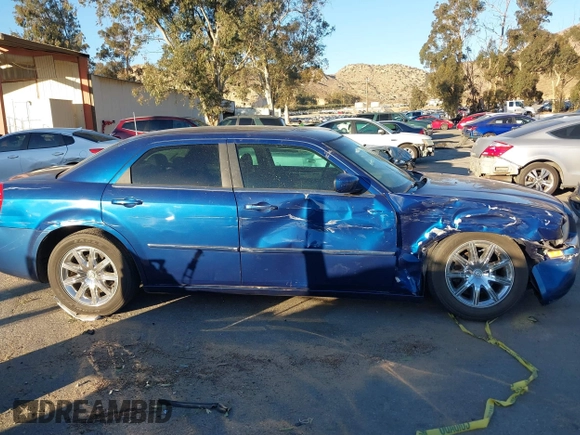 2009 Chrysler 300 Touring with VIN 2C3LA53V89H565270, listed as a IAAI auction lot 41069505 with 112,830 mi miles. Bid and sale history available at carsss.com. Image 13.