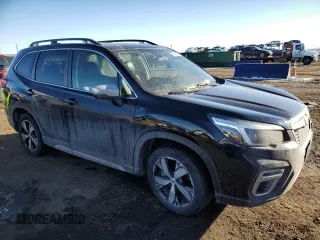 2021 Subaru Forester Touring z VIN JF2SKAXC7MH420761, wystawiony jako Copart lot #41801165 z przebiegiem 64 089 mil mil oraz Szkoda całkowita • Salvage title. Historia ofert i sprzedaży dostępna na DreamBid. Obrazek 4.