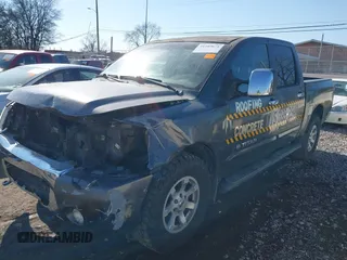 2005 Nissan Titan SE with VIN 1N6BA07B15N569959, listed as a IAAI auction lot 41389671 with 188,335 mi miles and . Bid and sale history available at DreamBid. Image 2.