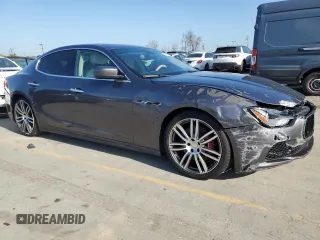 2016 Maserati Ghibli S Q4 z VIN ZAM57RTA8G1173582, wystawiony jako Copart lot #56072145 z przebiegiem Nie podano mil oraz Szkody całkowita. Historia ofert i sprzedaży dostępna na DreamBid. Obrazek 4.