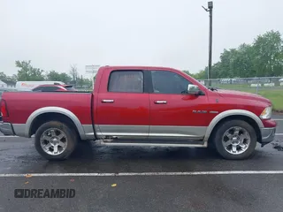 2010 Dodge 1500 Sport z VIN 1D7RV1CT0AS128075, wystawiony jako IAAI lot #42277733 z przebiegiem 301 432 mil mil oraz . Historia ofert i sprzedaży dostępna na DreamBid. Obrazek 13.