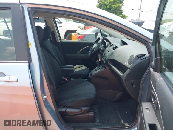 2013 Mazda 5 Sport z VIN JM1CW2BL8D0162446, wystawiony jako IAAI lot #42480874 z przebiegiem 158 223 mil mil oraz . Historia ofert i sprzedaży dostępna na DreamBid. Obrazek 5.