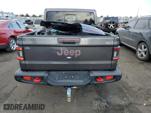 2021 Jeep Gladiator Rubicon with VIN 1C6JJTBG4ML504141, listed as a Copart auction lot 43367565 with 56,879 mi miles and Salvage title. Bid and sale history available at DreamBid. Image 6.