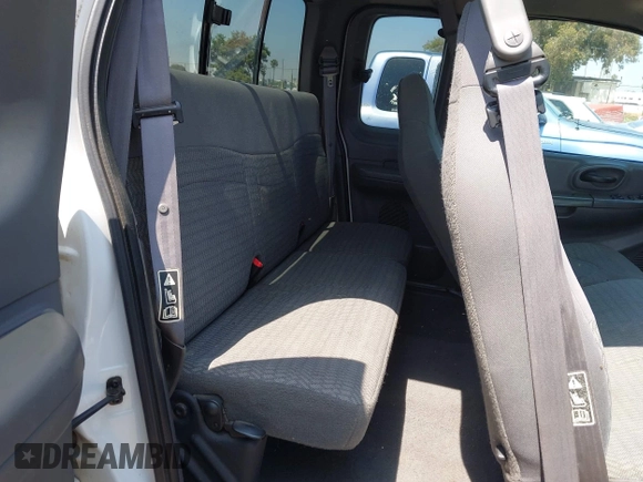2000 Ford F-150 XL with VIN 1FTRX17L2YNA03263, listed as a IAAI auction lot 42326528 with Not provided miles and . Bid and sale history available at DreamBid. Image 8.