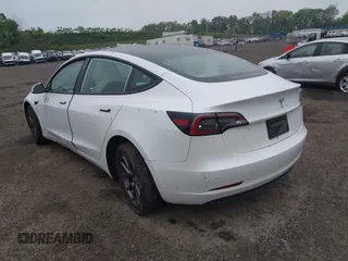 2023 Tesla Model 3 with VIN 5YJ3E1EA2PF626392, listed as a IAAI auction lot 42288413 with 25,605 mi miles and . Bid and sale history available at DreamBid. Image 3.