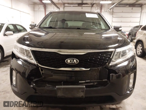 2015 Kia Sorento LX with VIN 5XYKTCA66FG573928, listed as a IAAI auction lot 42017586 with 174,939 mi miles. Bid and sale history available at carsss.com. Image 6.
