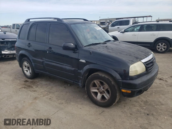 2003 Suzuki Grand Vitara z VIN JS3TE62V834101506, wystawiony jako Copart lot #47094765 z przebiegiem 240 778 mil mil oraz Szkoda całkowita • Salvage title. Historia ofert i sprzedaży dostępna na DreamBid. Obrazek 4.