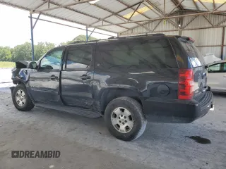 2012 Chevrolet Suburban LT with VIN 1GNSKJE77CR224789, listed as a Copart auction lot 63944485 with 228,477 mi miles and Salvage title. Bid and sale history available at DreamBid. Image 2.