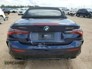 2023 BMW 4 Series M440i with VIN WBA53AT03PCL15153, listed as a Copart auction lot 49828855 with 7,354 mi miles and Salvage Title. Bid and sale history available at DreamBid. Image 6.