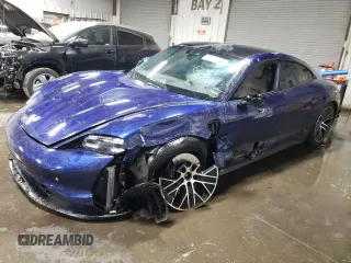 2021 Porsche Taycan z VIN WP0AA2Y13MSA14773, wystawiony jako Copart lot #69774042 z przebiegiem 15 465 mil mil oraz . Historia ofert i sprzedaży dostępna na DreamBid. Obrazek 1.