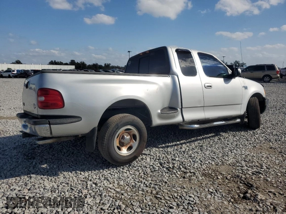 1999 Ford F-150 z VIN 1FTRX07WXXKB92796, wystawiony jako Copart lot #48352405 z przebiegiem Nie podano mil oraz Szkoda całkowita • Salvage title. Historia ofert i sprzedaży dostępna na DreamBid. Obrazek 3.