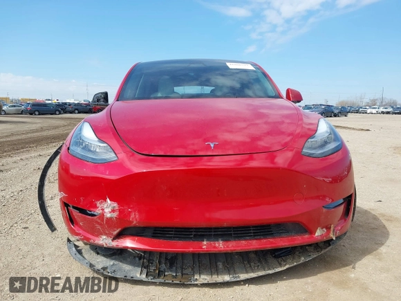2023 Tesla Model Y Long Range with VIN 7SAYGDEE6PA157652, listed as a IAAI auction lot 41866777 with 22,584 mi miles. Bid and sale history available at carsss.com. Image 12.
