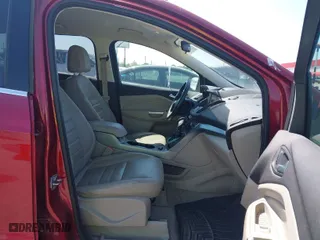 2015 Ford Escape SE with VIN 1FMCU0GXXFUA57386, listed as a IAAI auction lot 42043058 with 107,635 mi miles. Bid and sale history available at carsss.com. Image 5.