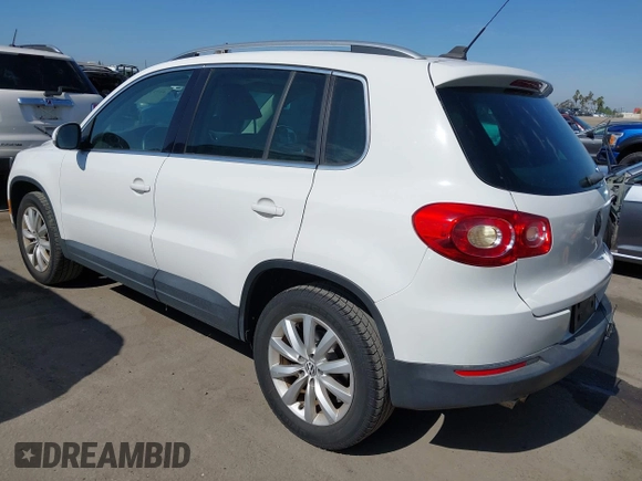 2011 Volkswagen Tiguan SEL with VIN WVGBV7AXXBW554267, listed as a IAAI auction lot 42773354 with 70,547 mi miles and . Bid and sale history available at DreamBid. Image 3.