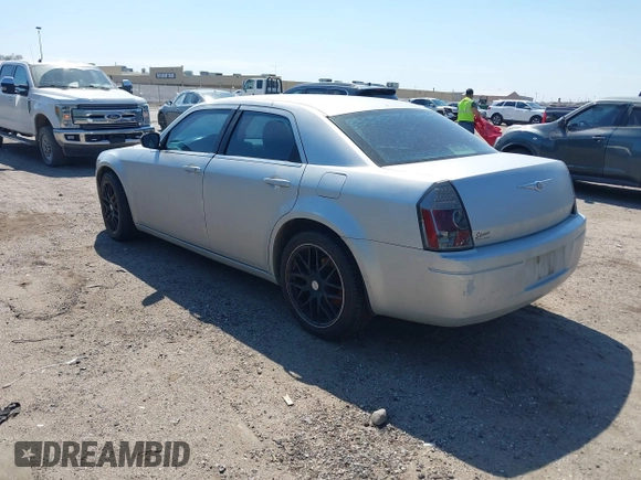 2007 Chrysler 300 with VIN 2C3KA43R67H664434, listed as a IAAI auction lot 41884172 with 238,451 mi miles. Bid and sale history available at carsss.com. Image 3.