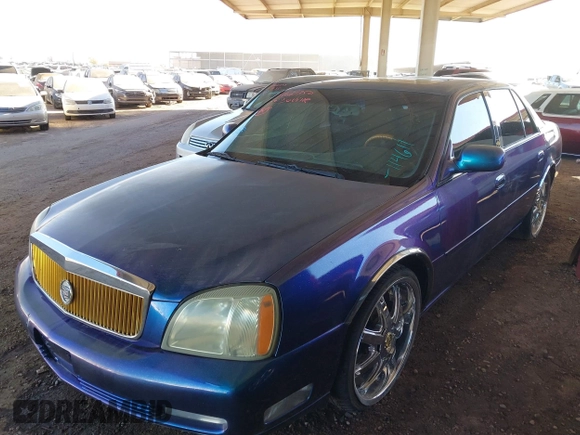 2003 Cadillac DeVille DTS z VIN 1G6KF57943U114611, wystawiony jako IAAI lot #41661350 z przebiegiem 160 762 mil mil oraz . Historia ofert i sprzedaży dostępna na DreamBid. Obrazek 2.