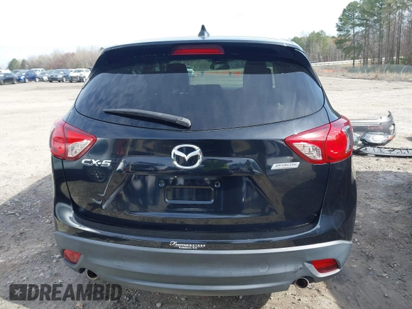 2014 Mazda CX-5 Touring with VIN JM3KE2CY9E0333951, listed as a IAAI auction lot 41825345 with 124,684 mi miles. Bid and sale history available at carsss.com. Image 16.