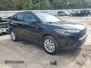 2022 Toyota Corolla Cross LE with VIN 7MUCAABG3NV021235, listed as a Copart auction lot 60644285 with 82,403 mi miles and Clean title. Bid and sale history available at DreamBid. Image 4.