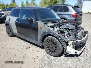2014 MINI Hardtop with VIN WMWXM5C53ET934213, listed as a Copart auction lot 53663755 with 112,975 mi miles and Clean Title. Bid and sale history available at DreamBid. Image 4.