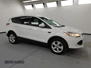 2015 Ford Escape SE with VIN 1FMCU9G90FUB09601, listed as a Copart auction lot 54174665 with 84,560 mi miles and Clean Title. Bid and sale history available at DreamBid. Image 4.