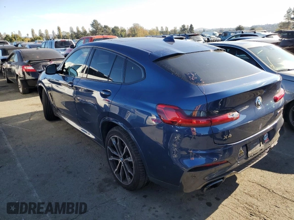 2020 BMW X4 M40i with VIN 5UX2V5C05LLE69575, listed as a Copart auction lot 75055123 with 59,810 mi miles. Bid and sale history available at carsss.com. Image 2.