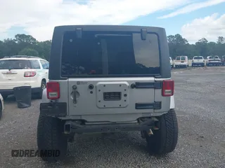 2016 Jeep Wrangler Unlimited Sahara with VIN 1C4BJWEG5GL117872, listed as a IAAI auction lot 42692798 with 119,819 mi miles and . Bid and sale history available at DreamBid. Image 16.