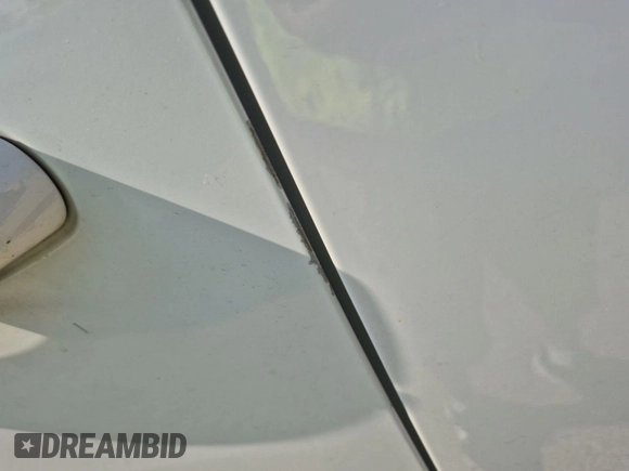 2022 Chevrolet Traverse LT Cloth with VIN 1GNEVGKW7NJ151086, listed as a IAAI auction lot 42613997 with 80,287 mi miles and . Bid and sale history available at DreamBid. Image 16.