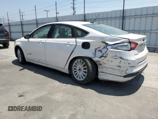 2014 Ford Fusion SE Hybrid with VIN 3FA6P0LU7ER151225, listed as a Copart auction lot 64989915 with 135,763 mi miles and Salvage title. Bid and sale history available at DreamBid. Image 2.