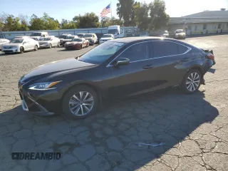 2021 Lexus ES with VIN 58ACA1C1XMU001292, listed as a Copart auction lot 77035514 with 142,564 mi miles and Salvage Title. Bid and sale history available at carsss.com. Image 1.