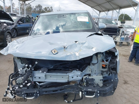 2023 Rivian R1T Adventure with VIN 7FCTGBAA9PN027894, listed as a IAAI auction lot 42061339 with 5,047 mi miles. Bid and sale history available at carsss.com. Image 12.
