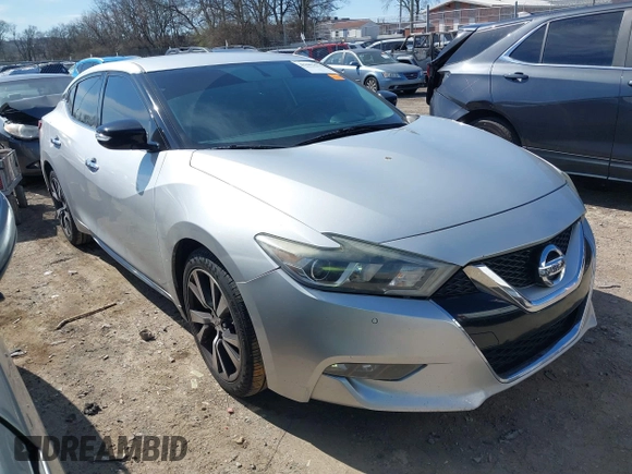 2016 Nissan Maxima Platinum with VIN 1N4AA6AP1GC400986, listed as a IAAI auction lot 41603612 with 171,784 mi miles and . Bid and sale history available at DreamBid. Image 1.