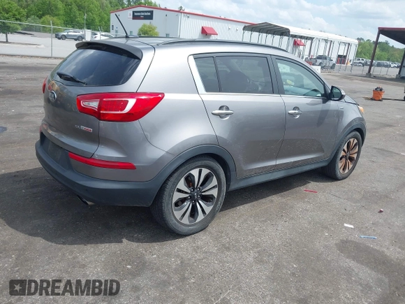 2013 Kia Sportage SX with VIN KNDPCCA62D7506937, listed as a IAAI auction lot 41967245 with 110,151 mi miles and . Bid and sale history available at carsss.com. Image 4.